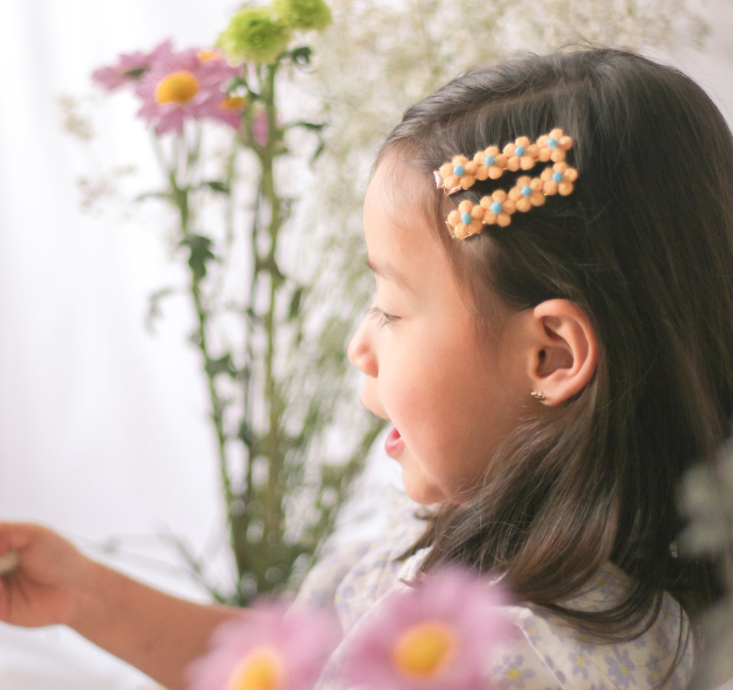 Flores de lana con piedras